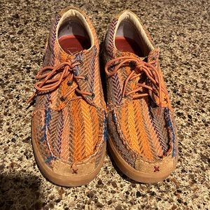 Multicolored Twisted X shoes.